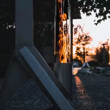 Standing patio torch with flame